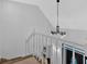 Entryway features a white banister and wrought iron chandelier above at 4990 Sawgrass Nw Pl, Acworth, GA 30102
