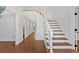 Bright foyer with hardwood floors and staircase at 4990 Sawgrass Nw Pl, Acworth, GA 30102