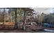 Property showing a house situated on an expansive lot with mature trees, with multiple cars parked outside at 594 Collinsworth Rd, Palmetto, GA 30268