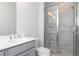 Bathroom showcasing a tile shower and modern vanity at 2971 Beaconwood Ct, Lawrenceville, GA 30043