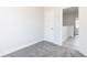 Bedroom with carpet, neutral walls, and an open doorway at 2971 Beaconwood Ct, Lawrenceville, GA 30043