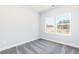 Bright bedroom with carpet and view to the outside at 2971 Beaconwood Ct, Lawrenceville, GA 30043