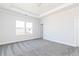 Spacious bedroom featuring neutral paint and carpet flooring at 2971 Beaconwood Ct, Lawrenceville, GA 30043