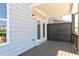 A cozy wooden deck with doors leading inside provides an inviting outdoor living space at 2971 Beaconwood Ct, Lawrenceville, GA 30043