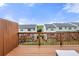 Exterior deck with wooden railing overlooks common green space at 3542 Chattahoochee Summit Se Ln, Atlanta, GA 30339
