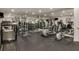 Home gym equipped with treadmill, elliptical, free weights, and a mirrored wall at 3542 Chattahoochee Summit Se Ln, Atlanta, GA 30339