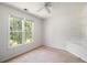 Unfurnished bedroom with large window at 3774 Seasons Nw Dr, Acworth, GA 30101