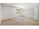 Spacious bedroom with a window and ceiling fan, offering ample natural light at 3774 Seasons Nw Dr, Acworth, GA 30101