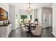 Elegant dining area features a bay window and stylish light fixture at 3774 Seasons Nw Dr, Acworth, GA 30101