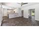 Open concept living area leading to the kitchen, with great natural light at 3774 Seasons Nw Dr, Acworth, GA 30101