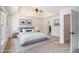 The spacious main bedroom includes a trey ceiling, fan, and ensuite bath at 3774 Seasons Nw Dr, Acworth, GA 30101