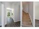 View of the entryway featuring wood flooring and a staircase leading upstairs at 3774 Seasons Nw Dr, Acworth, GA 30101