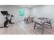Finished basement featuring an exercise bike, foosball, and table for gaming at 4219 Harrogate Nw Dr, Atlanta, GA 30327