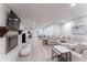 Finished basement with a fireplace, exercise bike and large living area at 4219 Harrogate Nw Dr, Atlanta, GA 30327