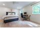 Bright bedroom with hardwood floors, neutral color scheme, and great natural light from windows at 4219 Harrogate Nw Dr, Atlanta, GA 30327