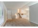 Hallway that features carpet flooring, natural lighting, a staircase, and neutral paint at 4905 Sandberg Ct, Stone Mountain, GA 30088