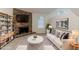 Inviting living room with a stone fireplace and stylish decor, perfect for relaxing or entertaining at 4905 Sandberg Ct, Stone Mountain, GA 30088
