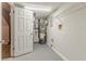 Well-equipped utility room with water heater and shelving, providing efficient space at 4905 Sandberg Ct, Stone Mountain, GA 30088