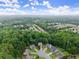 Sprawling neighborhood surrounded by mature green trees, offering a serene and private setting at 6160 Overleaf Ter, Cumming, GA 30040