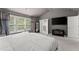 Spacious main bedroom with large windows, walk in closet, and high ceilings at 6160 Overleaf Ter, Cumming, GA 30040