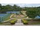 Outdoor playground with tennis courts surrounded by lush greenery in a well-maintained community at 6160 Overleaf Ter, Cumming, GA 30040