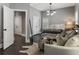 Inviting bedroom with sitting area and hardwood floors, offering a cozy and stylish retreat at 148 Canton St, Alpharetta, GA 30009
