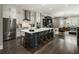 Open-concept kitchen with stainless steel appliances, large island, and hardwood floors at 148 Canton St, Alpharetta, GA 30009