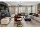 Bright living room features modern lighting, fireplace, built-ins, and stylish decor at 148 Canton St, Alpharetta, GA 30009