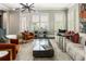 Bright living area with contemporary decor, large windows, and ample seating at 148 Canton St, Alpharetta, GA 30009
