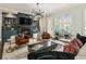 Cozy living room with fireplace, built-ins, and comfortable seating arrangement at 148 Canton St, Alpharetta, GA 30009