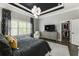 Spacious main bedroom featuring a walk-in closet, soft carpeting, and abundant natural light at 148 Canton St, Alpharetta, GA 30009