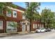 Exterior daytime view of a two-story brick building with street access and parked cars at 210 Walker Sw St # 3, Atlanta, GA 30313