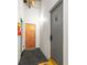 Building hallway featuring a gray entry door numbered 3 and a wooden door numbered 4 at 210 Walker Sw St # 3, Atlanta, GA 30313