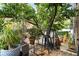 Brick-paved patio surrounded by lush greenery, offering a private outdoor space at 210 Walker Sw St # 3, Atlanta, GA 30313