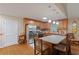 Kitchen space featuring a stainless steel refrigerator, wooden cabinets, and a skylight at 345 Jesse Martin Trl, Canton, GA 30115