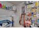 Functional laundry room with shelving, washer, and dryer offers convenience and storage space at 345 Jesse Martin Trl, Canton, GA 30115