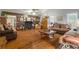 Comfortable living room showcasing hardwood floors, ample seating and natural light at 345 Jesse Martin Trl, Canton, GA 30115