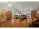 Open living room features hardwood floors, vaulted ceilings, and a charming entryway at 345 Jesse Martin Trl, Canton, GA 30115