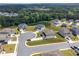 Aerial view of new construction homes nestled in a landscape surrounded by lush trees at 3455 Jasmine Sw Way, Atlanta, GA 30331