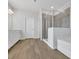 Modern bathroom with a glass-enclosed shower and a soaking tub at 3455 Jasmine Sw Way, Atlanta, GA 30331