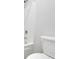 This bathroom has a standard shower with a handheld sprayer and grab bar at 3455 Jasmine Sw Way, Atlanta, GA 30331