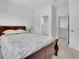 Bedroom with neutral walls and dark wood furnishings, closet, and attached bathroom at 3455 Jasmine Sw Way, Atlanta, GA 30331