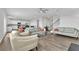 Bright and spacious living room with sofas, a coffee table, and an open-concept design at 3455 Jasmine Sw Way, Atlanta, GA 30331