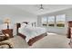 Bright main bedroom with large windows and a ceiling fan at 3455 Jasmine Sw Way, Atlanta, GA 30331