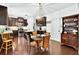 Open eat-in kitchen featuring granite island, stainless appliances, plenty of counter space and storage at 3975 Silverthorn Trce, Cumming, GA 30028