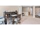 Home office with large desk features built-in shelving and comfortable chair at 6065 Crescent Landing Dr, Cumming, GA 30028