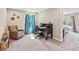 Home office/bedroom features a desk with chair, and a large window for lots of natural light at 6065 Crescent Landing Dr, Cumming, GA 30028