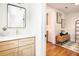 Bathroom featuring modern vanity with a framed mirror at 905 Gaston Sw St, Atlanta, GA 30310