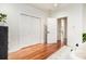 Spacious bedroom with hardwood floors and ample closet space with easy access to other rooms in the house at 905 Gaston Sw St, Atlanta, GA 30310
