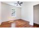 Bedroom with hardwood floors, closet and a window providing natural light at 905 Gaston Sw St, Atlanta, GA 30310